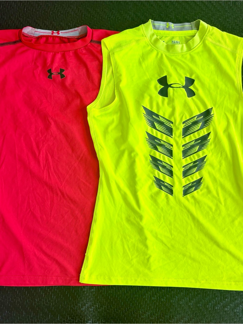 Boys lot of 2 Under Armour Neon and red Sleeveless Performance Shirts